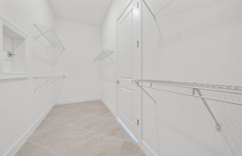 Owner's walk-in closet
