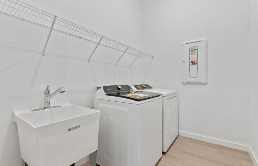 Laundry Room with Whirlpool Washer and Dryer