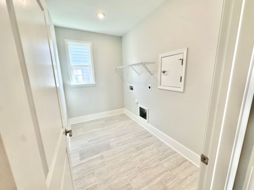 Laundry Room with a convenient door from Owner's Closet.