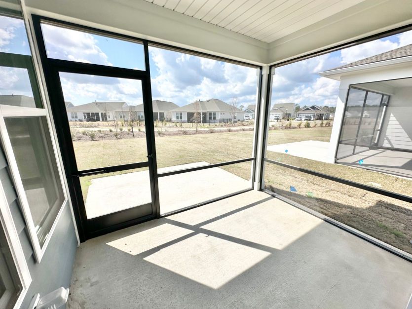 Screened-In Patio leading to pocket park.