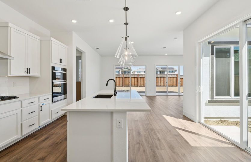 Kitchen open to cafe and gathering room