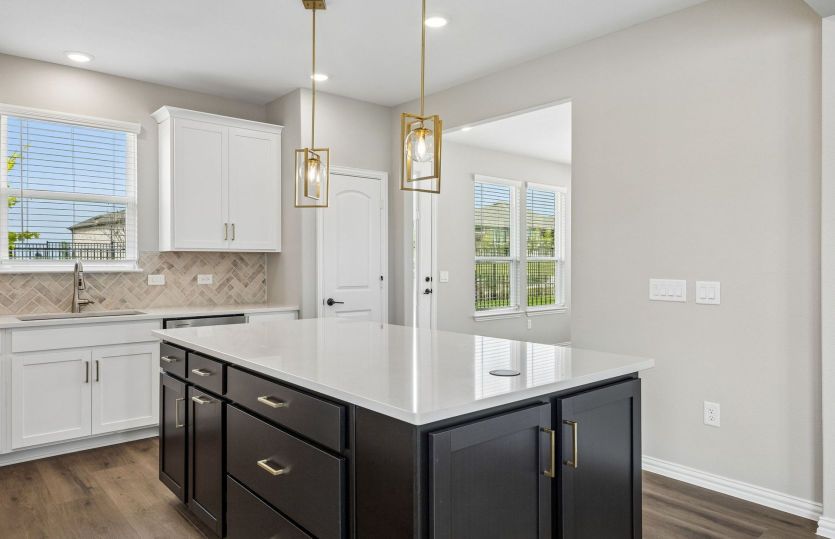 Kitchen with eat in bar top island