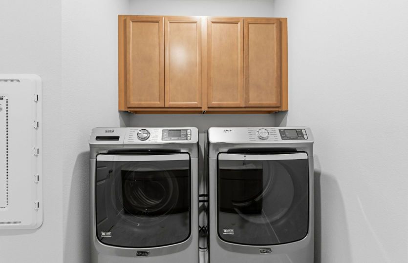 Laundry Room with Built-In Cabinets