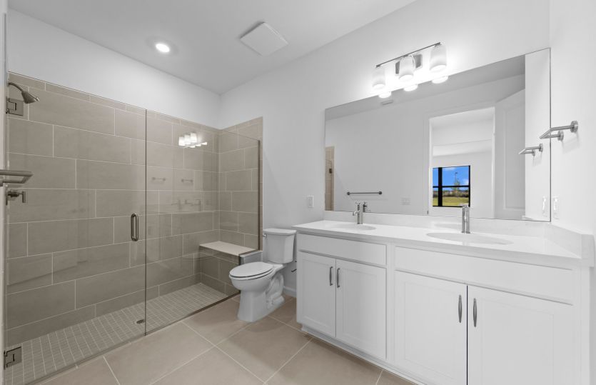 Owner's bathroom with dual-sink vanity