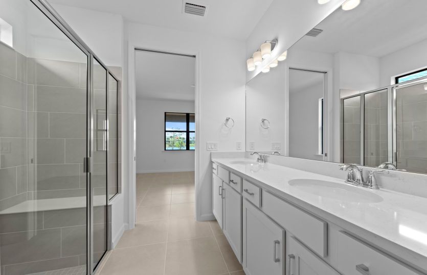 Owner's bathroom with dual-sink vanity