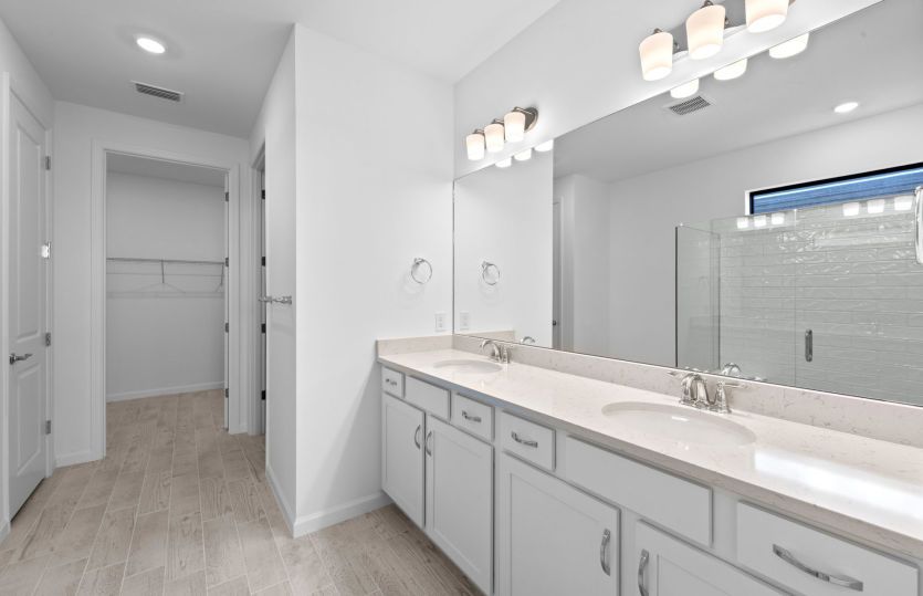 Owner's bathroom with dual-sink vanity
