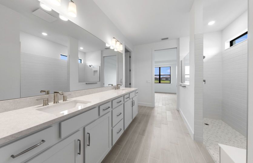 Owner's bathroom with dual-sink vanity