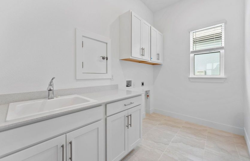 Laundry Room w/Built-in Cabinets