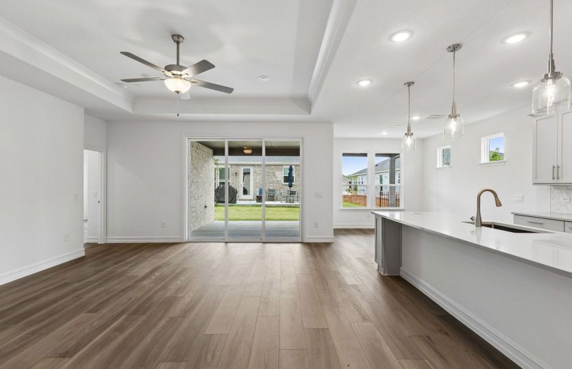 Gathering room with view of kitchen