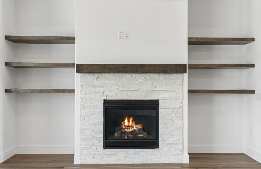 Gorgeous fireplace and shelving