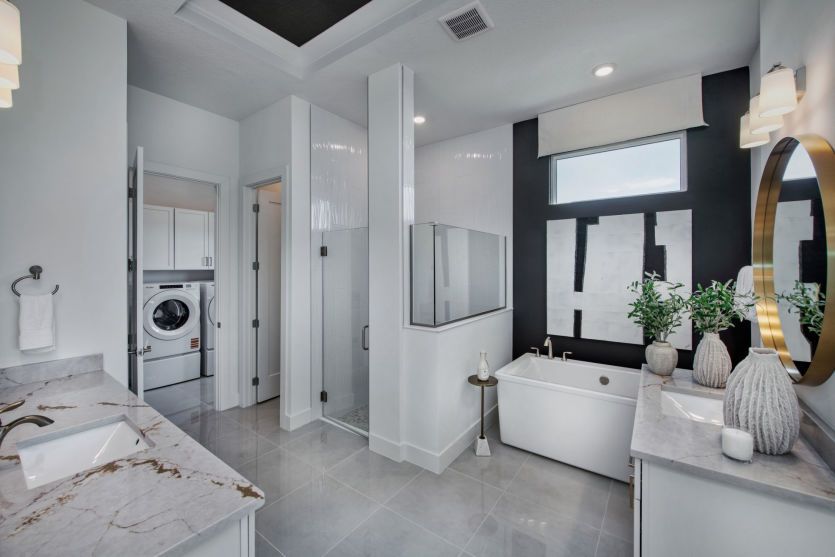 Walk-In Shower, Tub, and Connected Laundry Room