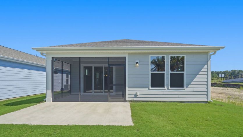 Exterior View of Patio and Screened Patio