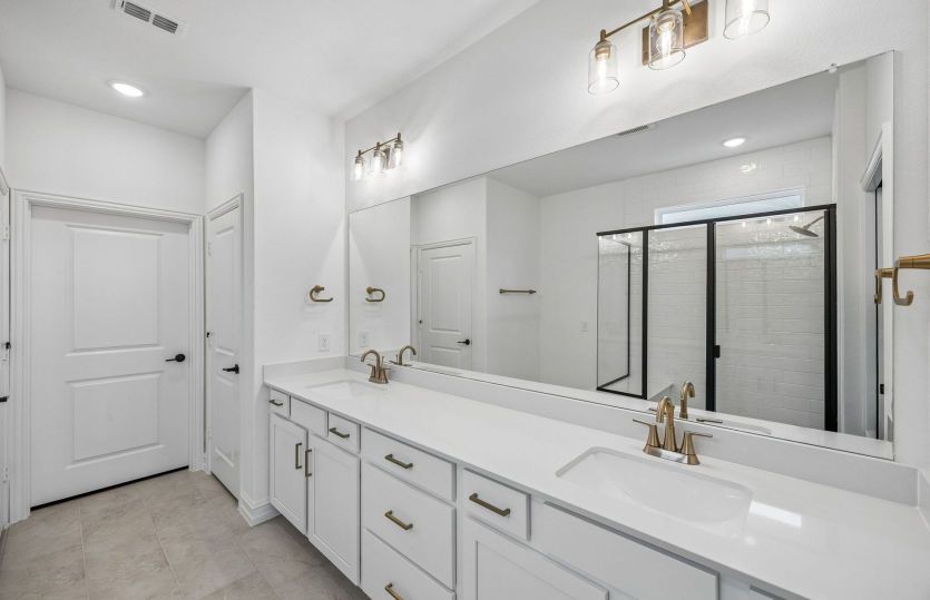 Primary bed with double vanity