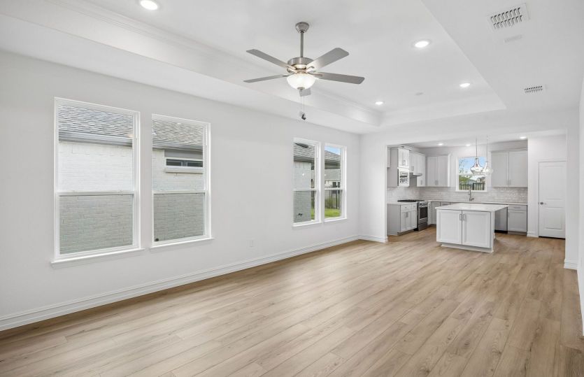 Tray ceiling and large windows in living room