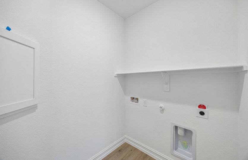 Built in shelving in laundry room