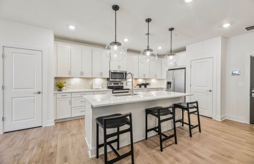 White Cabinetry and Quartz Countertops in the Kitchen