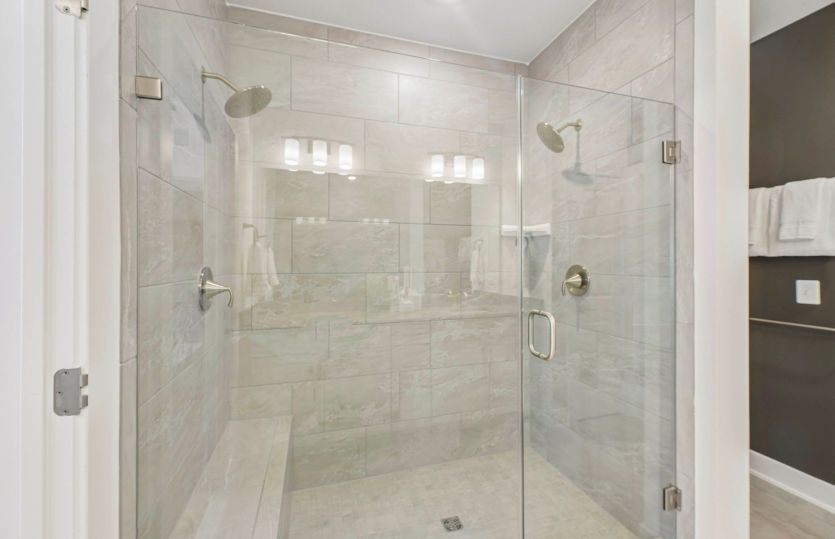 Frameless Glass Shower with Optional Second Shower Head in the Owner's Suite