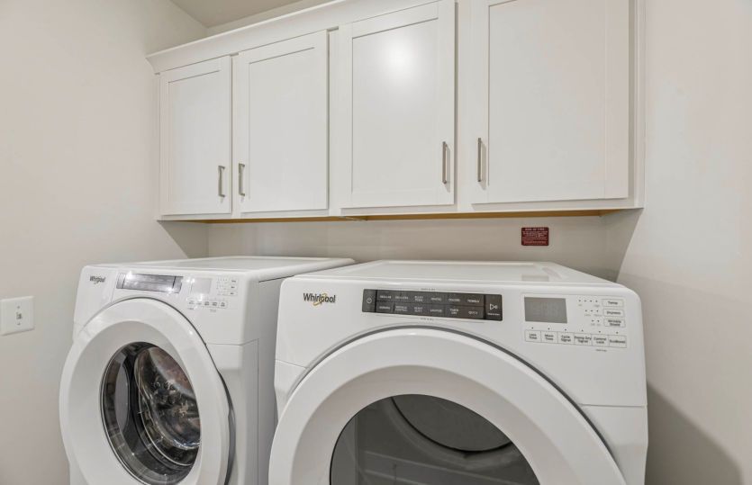 Laundry Room with Additional Cabinets for Storage