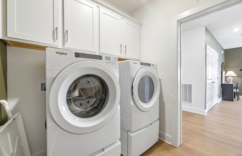 Laundry Room with Additional Cabinets for Storage