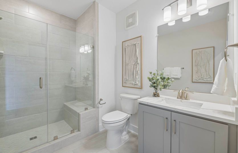 Hall Bath with Frameless Glass Shower and Seat