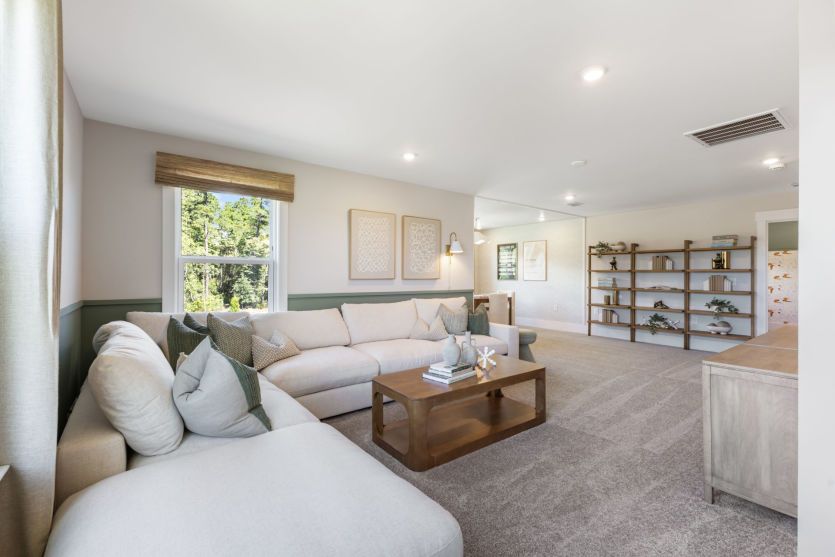 Versatile loft space for relaxing and recreation.