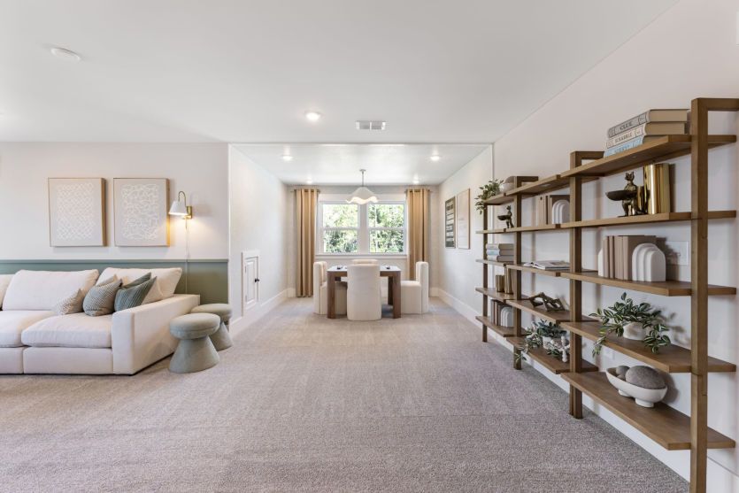 Versatile loft space for relaxing and recreation.