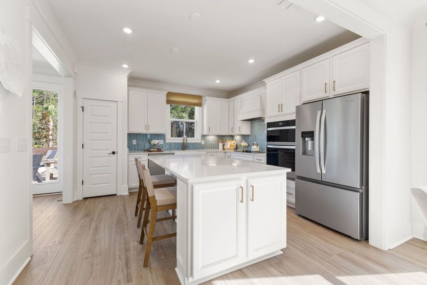 Beautiful Kitchen, that connects to the dining room space for easy access.