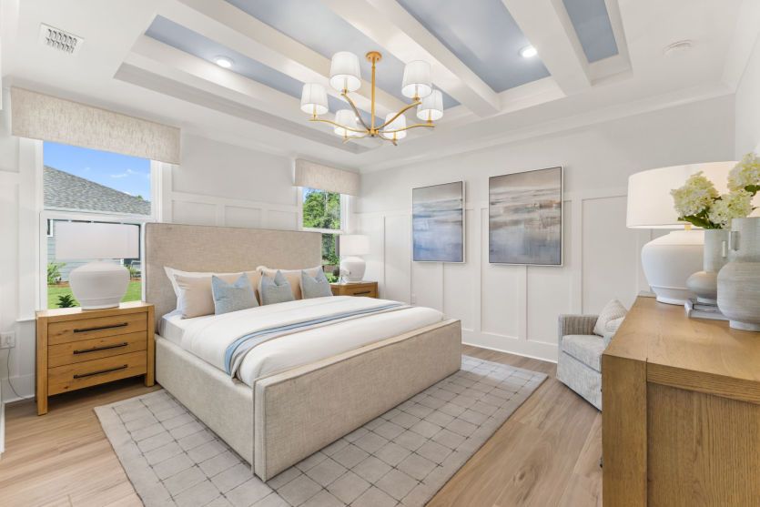 Large Owner's Suite Bedroom with large windows to bring in natural lighting.