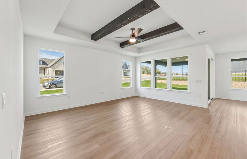 Large windows and natural light shown in living room