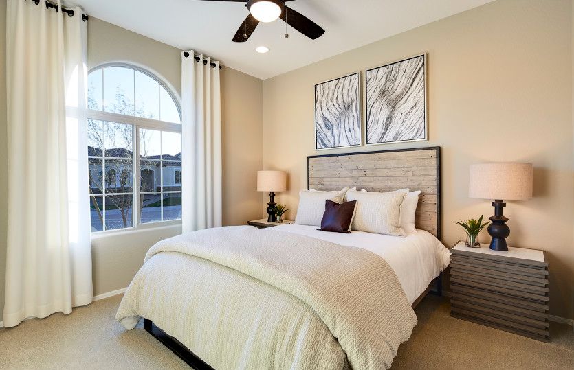 Secondary bedroom with bright windows and plenty of space