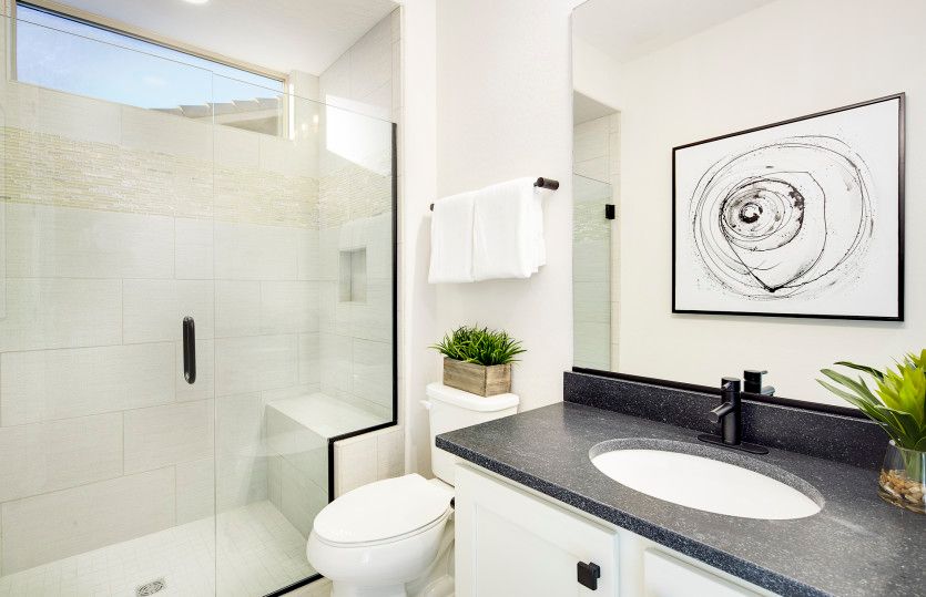 Secondary bathroom with glass walk-in shower