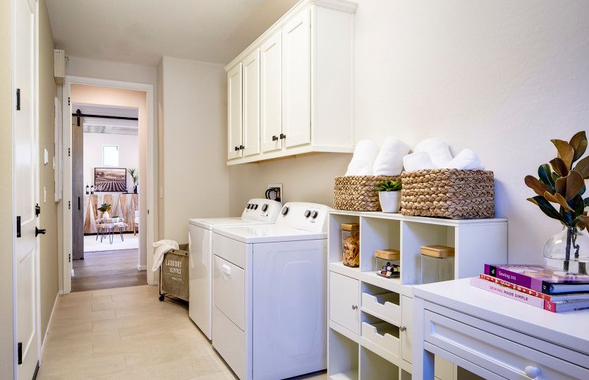 Laundry room with abundant cabinet space