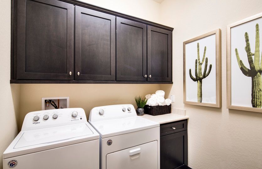 Laundry room with additional cabinet space