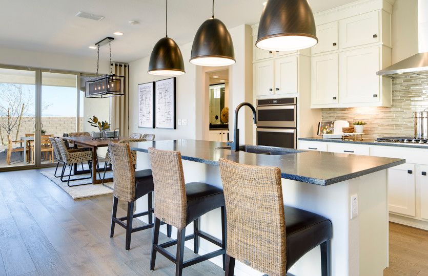 The openness allows for seamless transitions from the kitchen to the café to the gathering room
