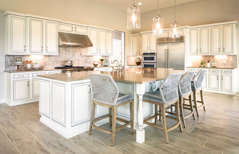 The kitchen is complete with an over-sized pantry and plenty of overhead lighting