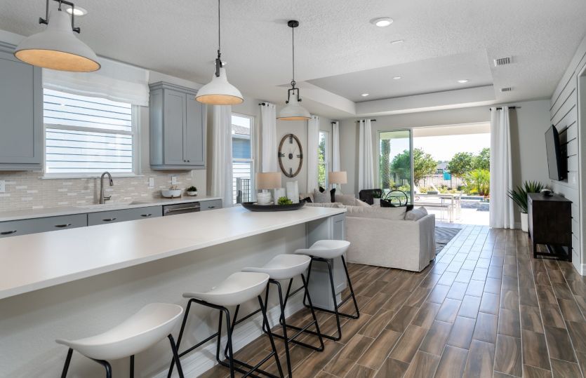 Bright kitchen featuring stainless steel appliances