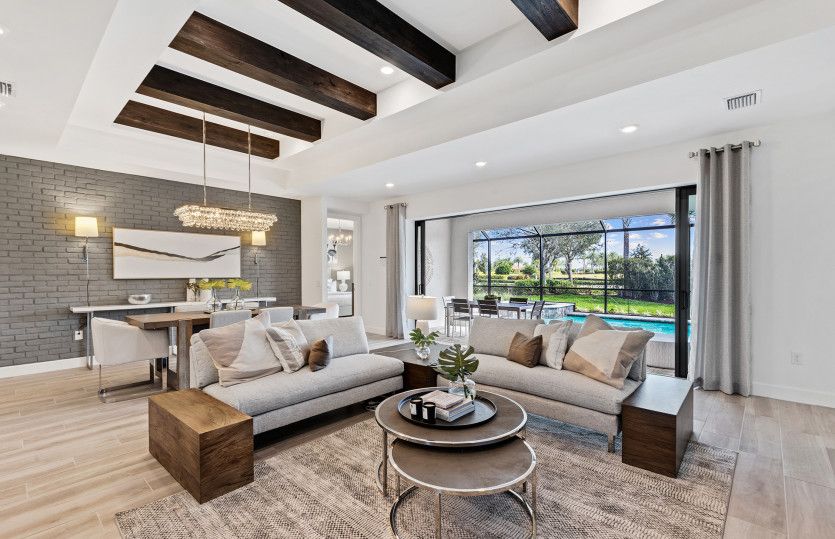 Connected gathering room with dual tray ceiling