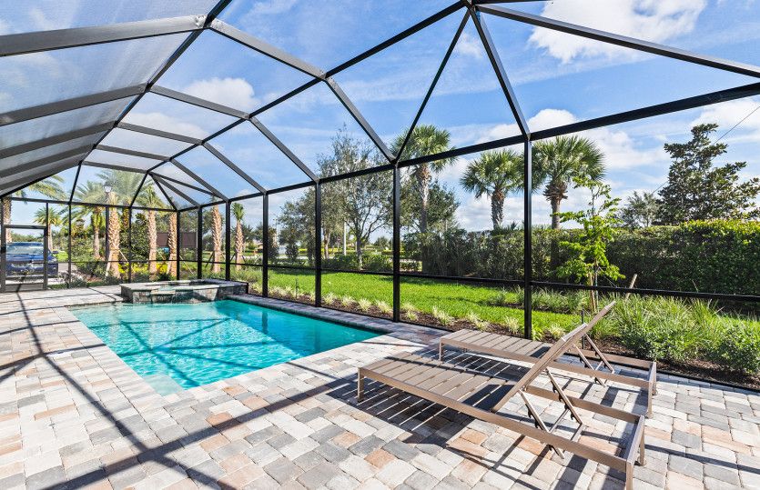 Screened-in pool with patio space, perfect for the southwest Florida lifestyle
