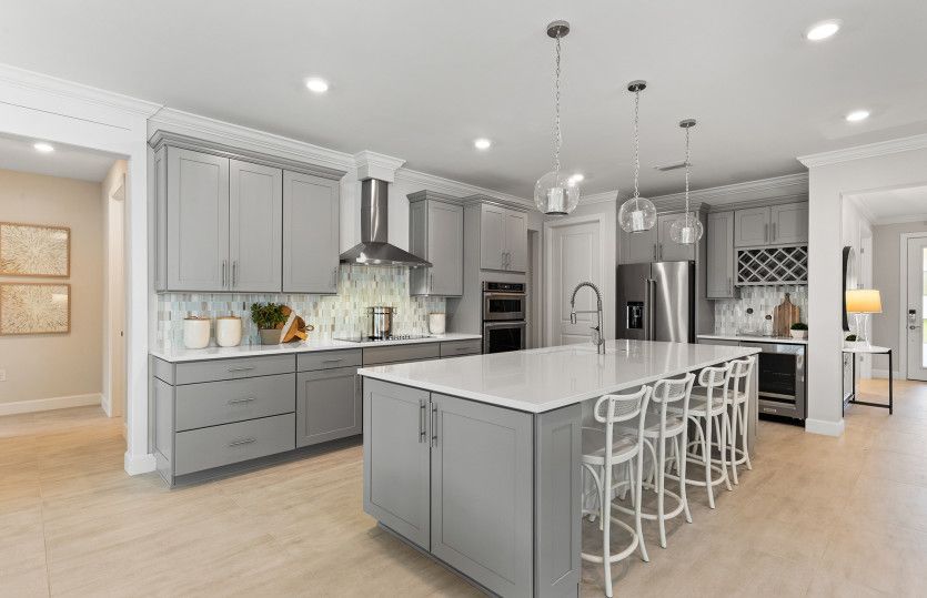 Kitchen with stainless steel appliances and designer finishes