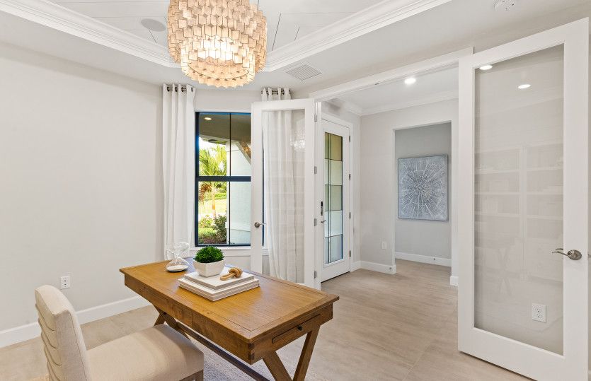 Enclosed flex room with doors, perfect for a home office or hobby room