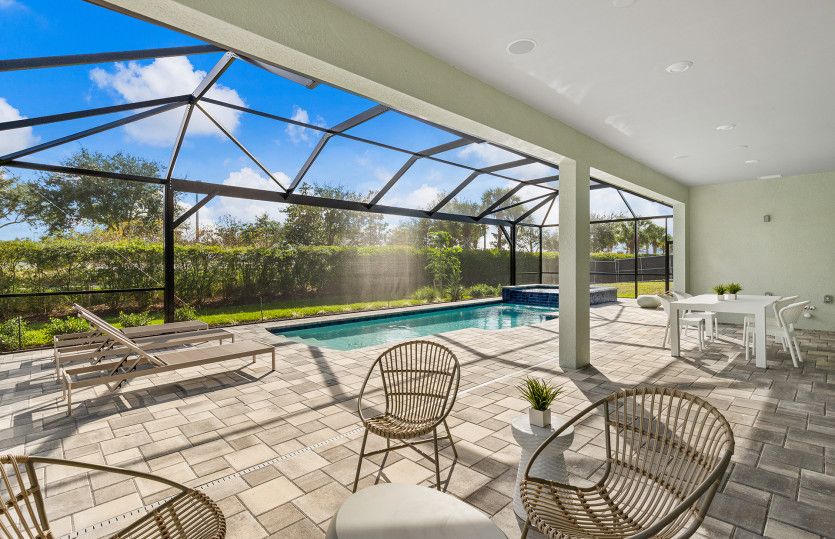 Covered lanai with pool and spa