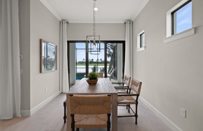Café area with sliding glass door to the lanai