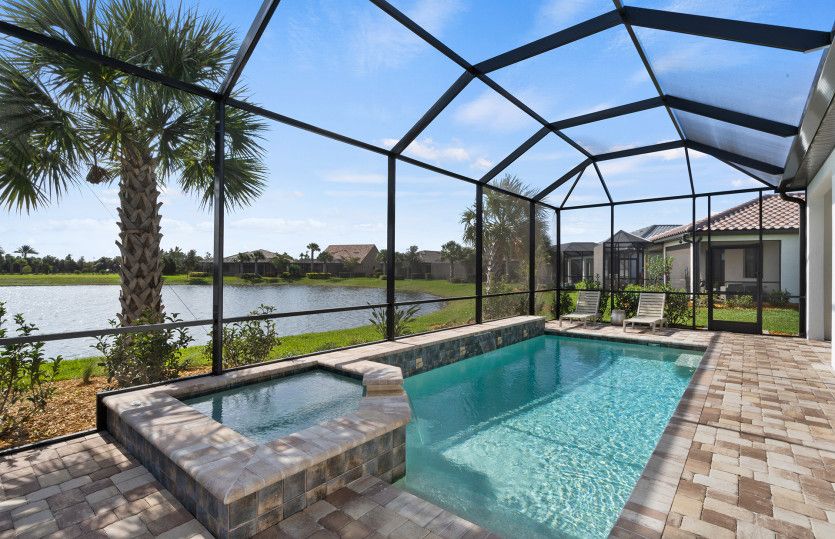 Pool and spa with raised wall