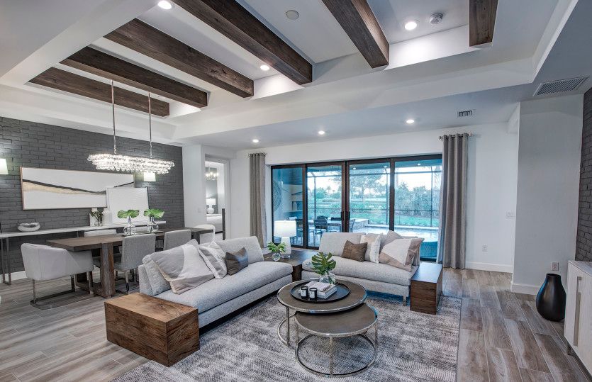 This new home in Ave Maria has the connected living spaces you are looking for