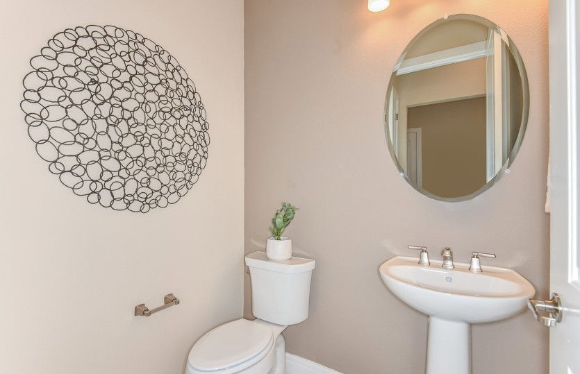Guest Bathroom Featuring Upscale Finishes