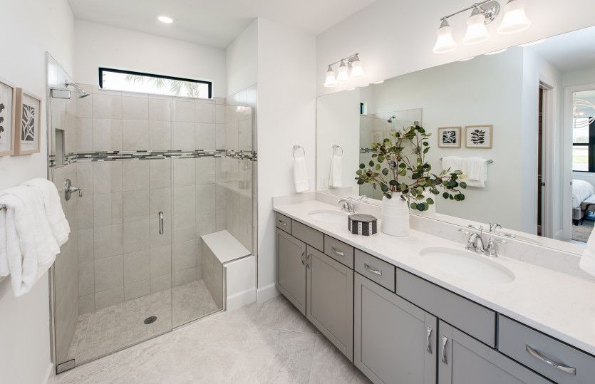 Luxurious owner's bathroom with dual sink vanity