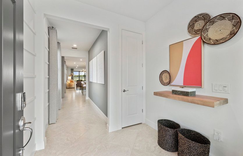 Inviting foyer with storage closet