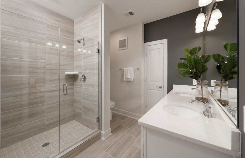 Luxurious Owner's Bath with an Optional Frameless Shower - Model Representation