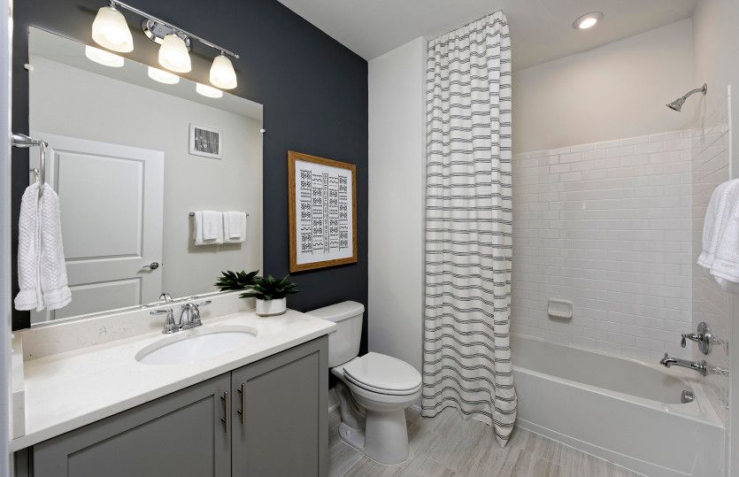 Hall Bathroom Situated Off of Foyer Near Guest Bedrooms - Model Representation