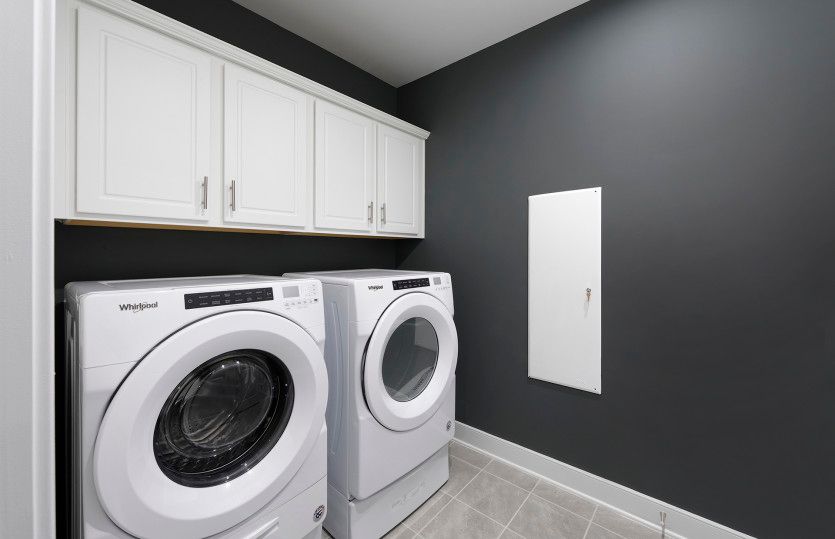 Convenient Laundry Room with Overhead Cabinetry for Extra Storage - Model Representation